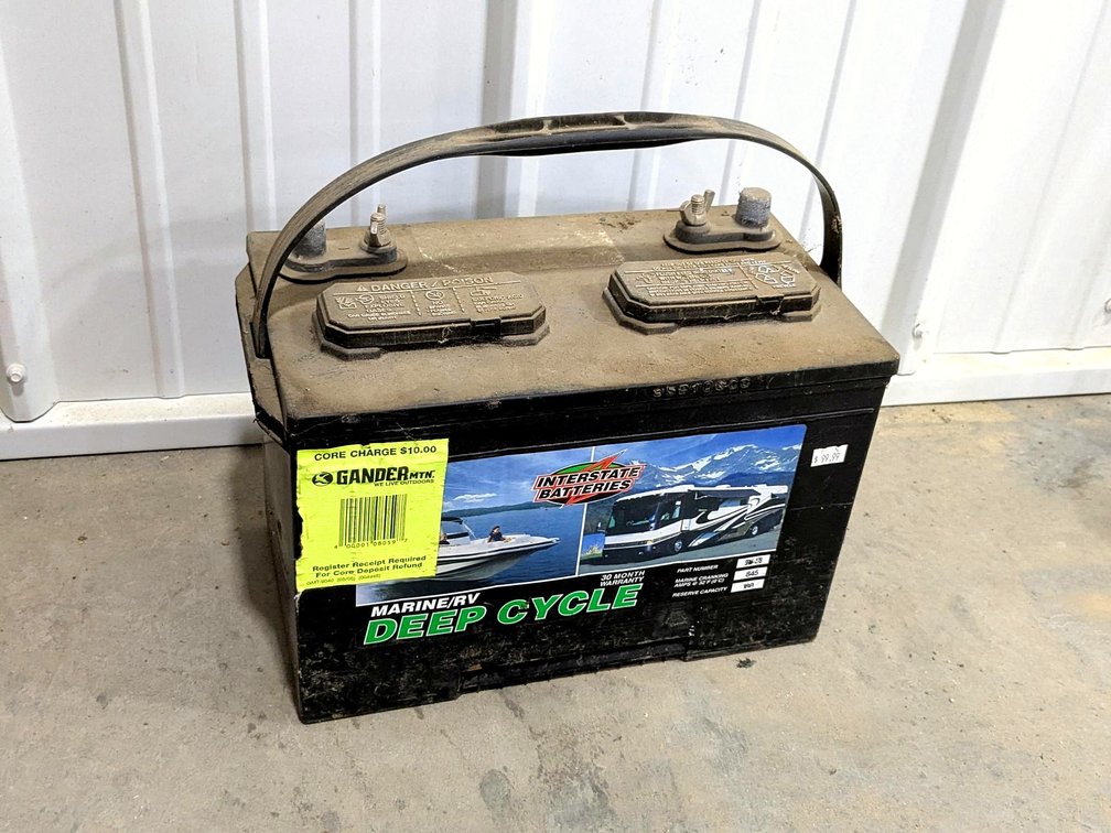 Interstate deep cycle marine battery measures approx. 13" x 7".