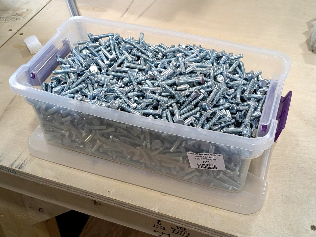 Shoe box sized tote is fill with 1/4" bolts up to 1-1/4".