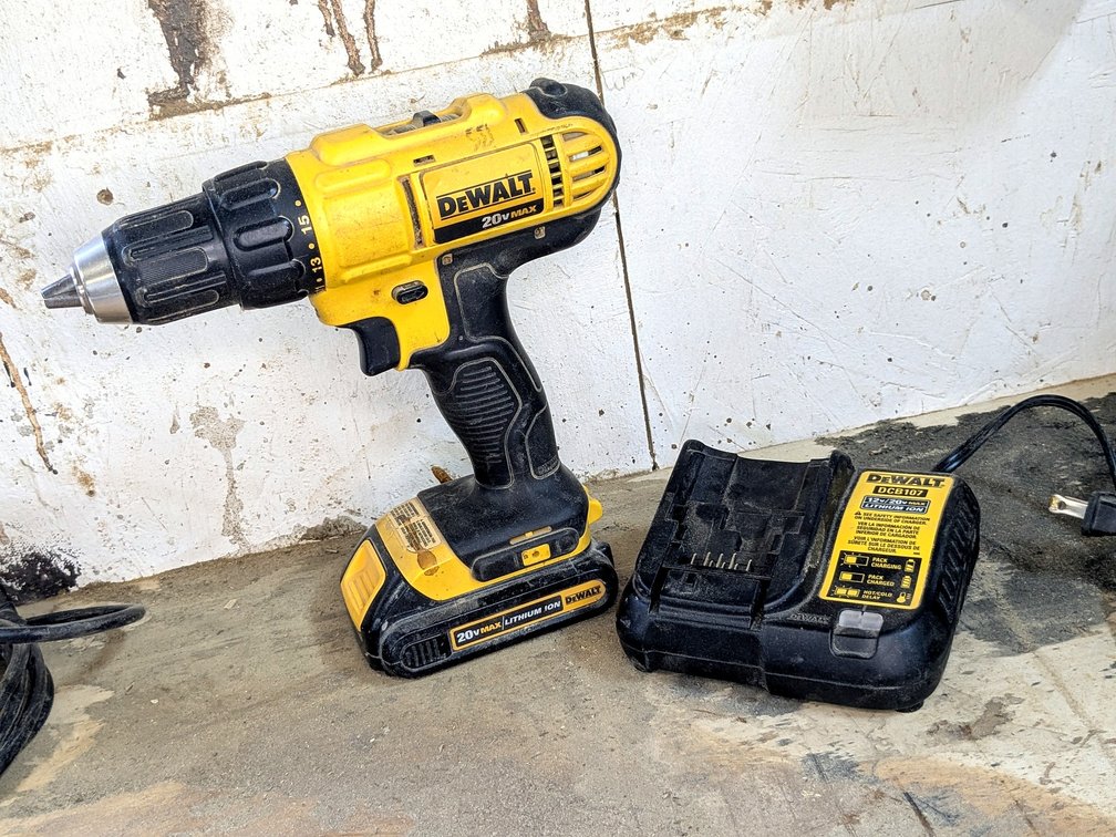 DeWalt 1/2" drill driver with charger is model DCD771.