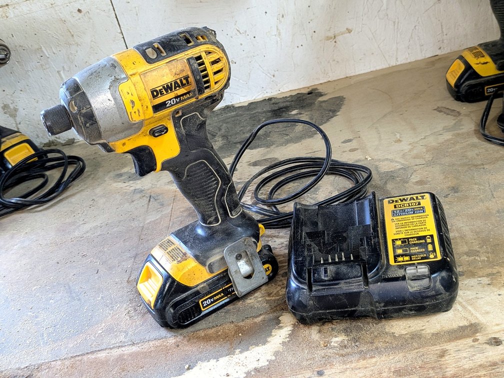 DeWalt 1/4" cordless impact driver with charger is model DCF885.