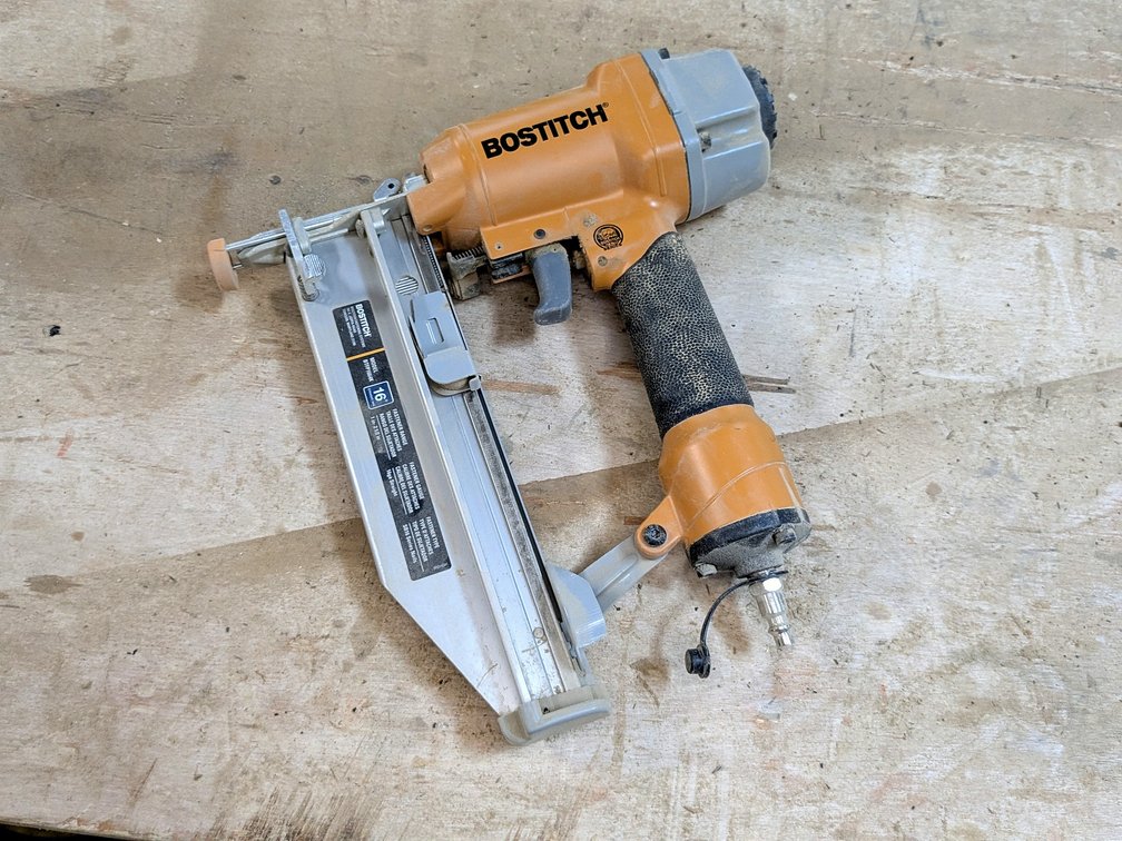 Bostitch 16 gauge nailer is model BTFP1664K and measures 12" long.