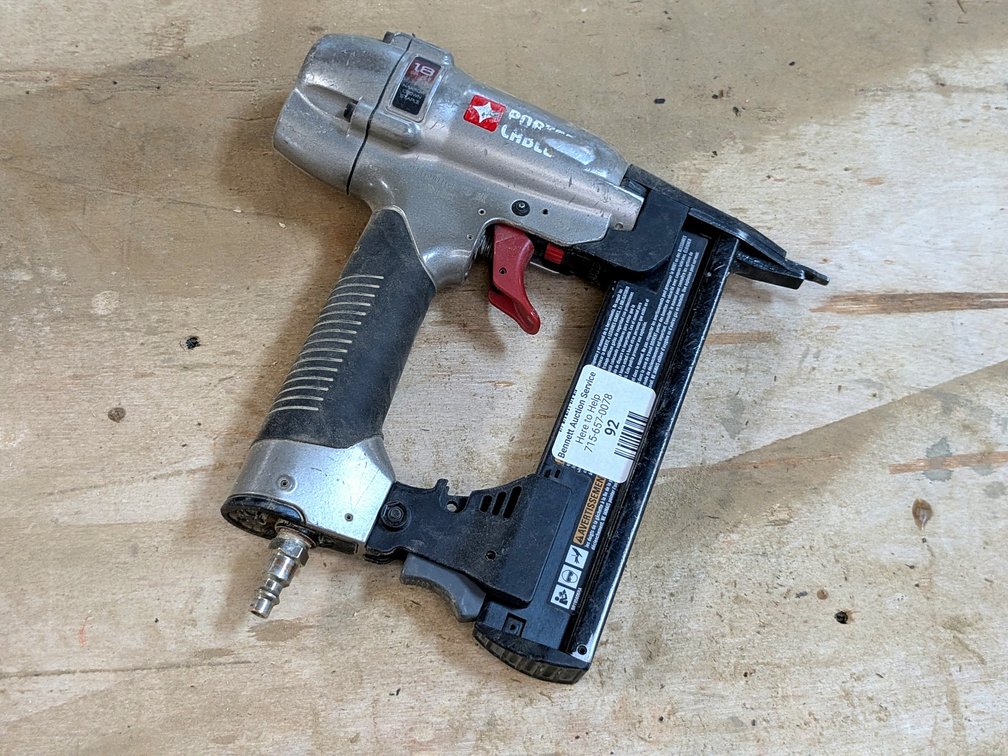 Porter Cable 18 gauge narrow crown stapler is about 10" long overall.