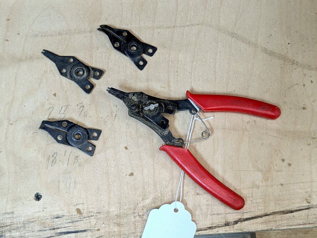 Snap ring pliers with 4 heads measures 6" as pictured.