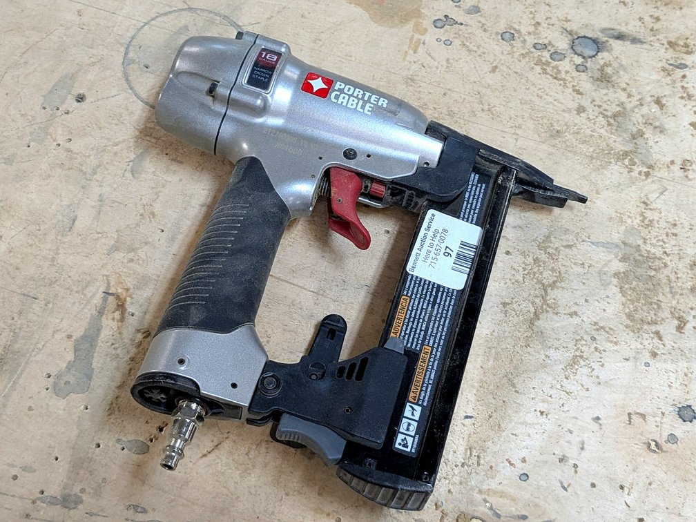 Porter Cable 18 gauge narrow crown stapler is about 10" long overall.