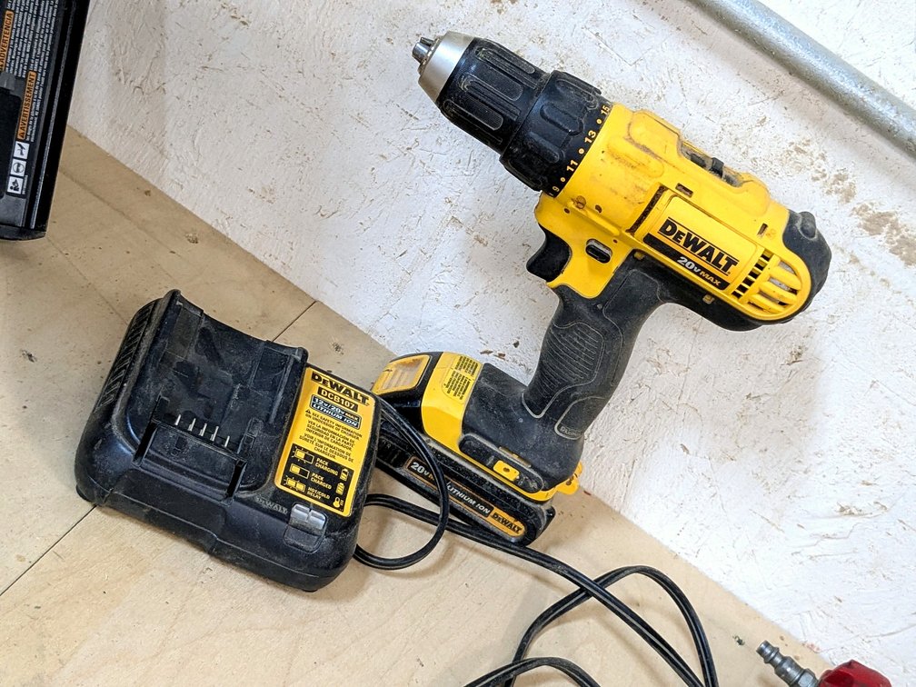 DeWalt 1/2" drill driver with charger is model DCD771.
