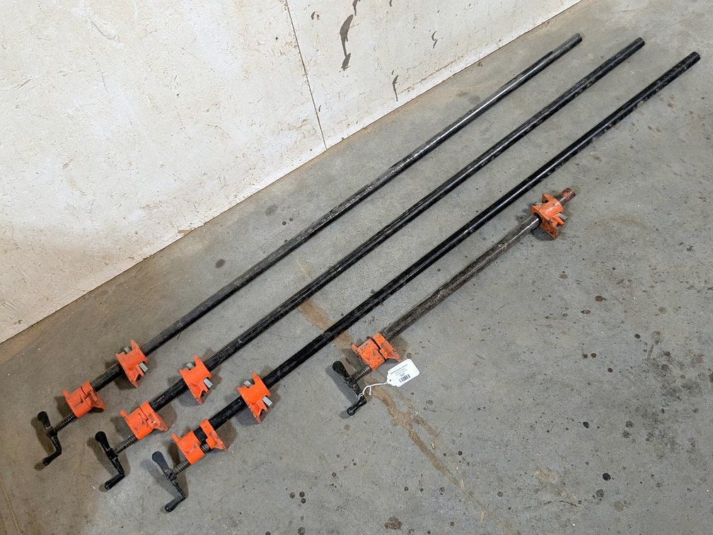 Four Pony brand pipe clamps up to 5'.