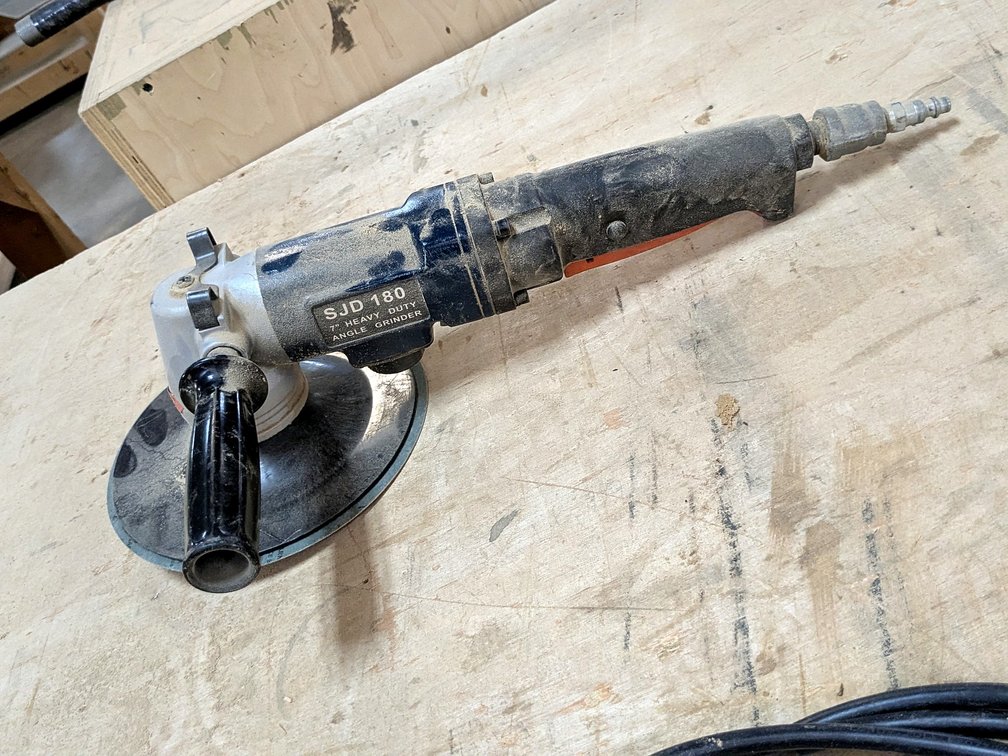 7" heavy duty angle grinder is model SJD180.
