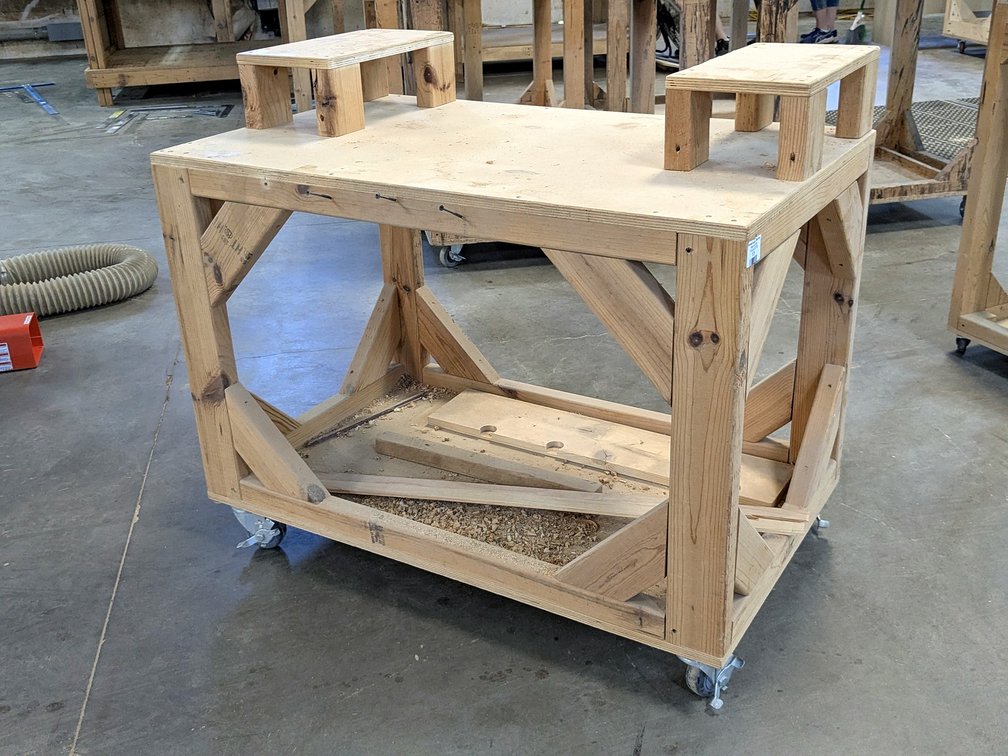 Tiered rolling workbench is 40" x 24" x 30" main work surface.