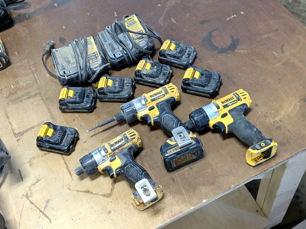 DeWalt cordless screw drivers seven batteries and two 12v/20vMax chargers mode DCB107.