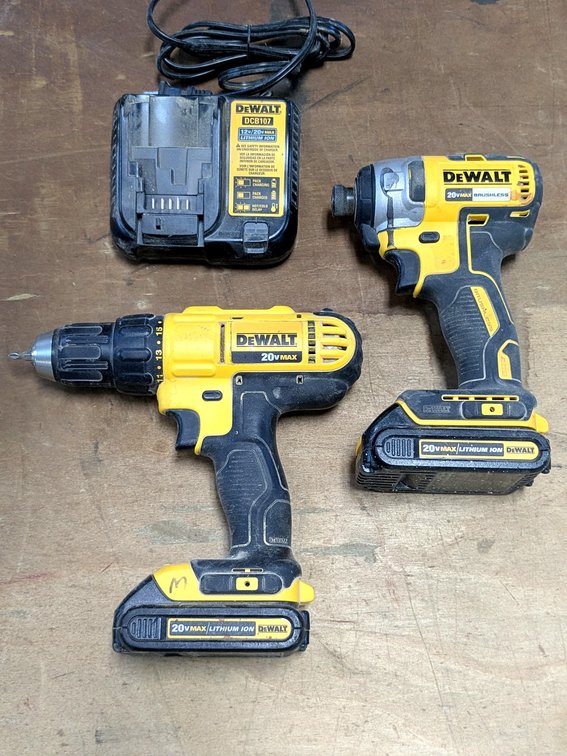 DeWalt DCF787 impact driver and DeWalt DCD771 drill driver with charger.