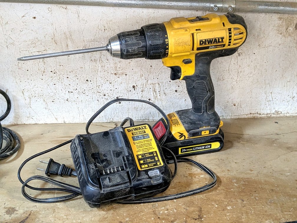 DeWalt 1/2 cordless drill driver with charger is model DCD771.