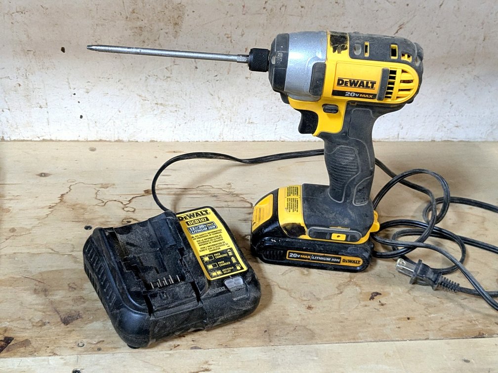 DeWalt 1/4" impact driver with charger is model DCF885.