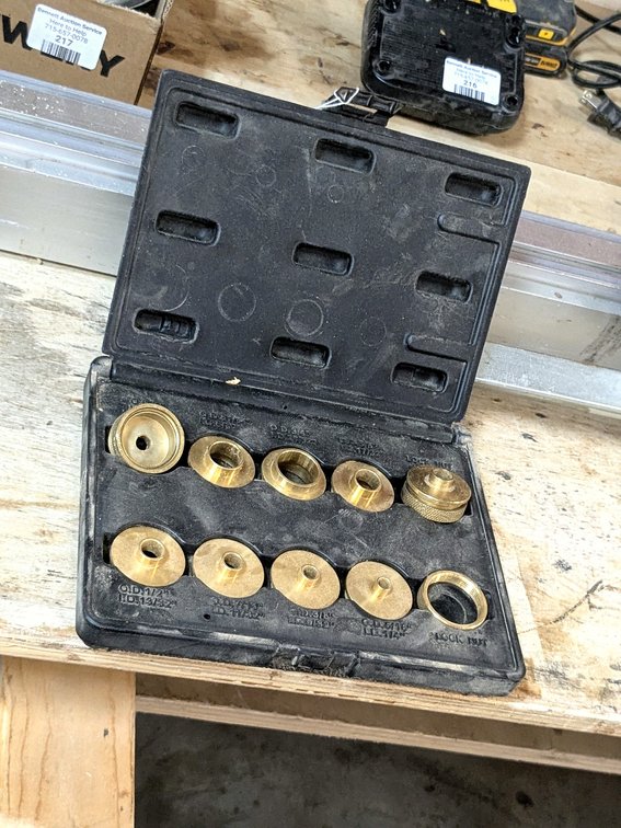 10 piece brass router bushing set.