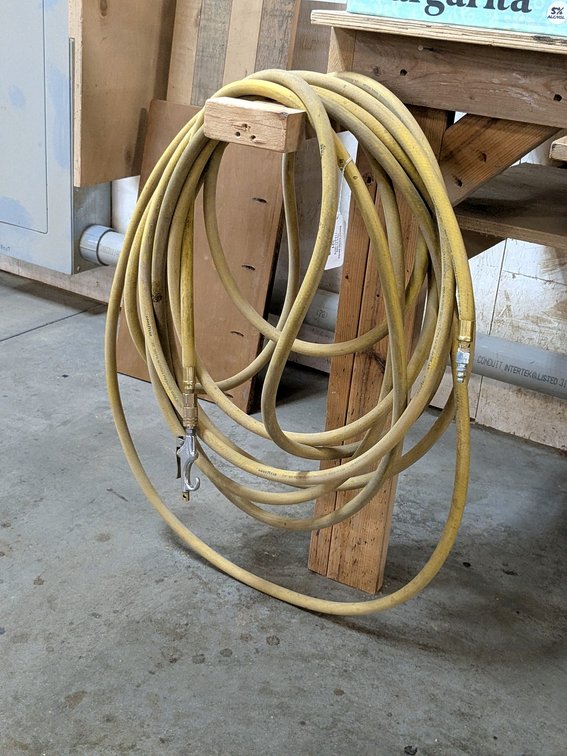 Goodyear 3/8" oil resistant air hose looks about 50'.
