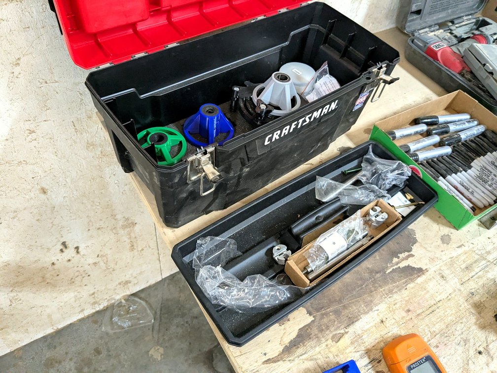 Craftsman 20 tool tote with lift out tray and a drilling guide kit, seamless shelf brackets.