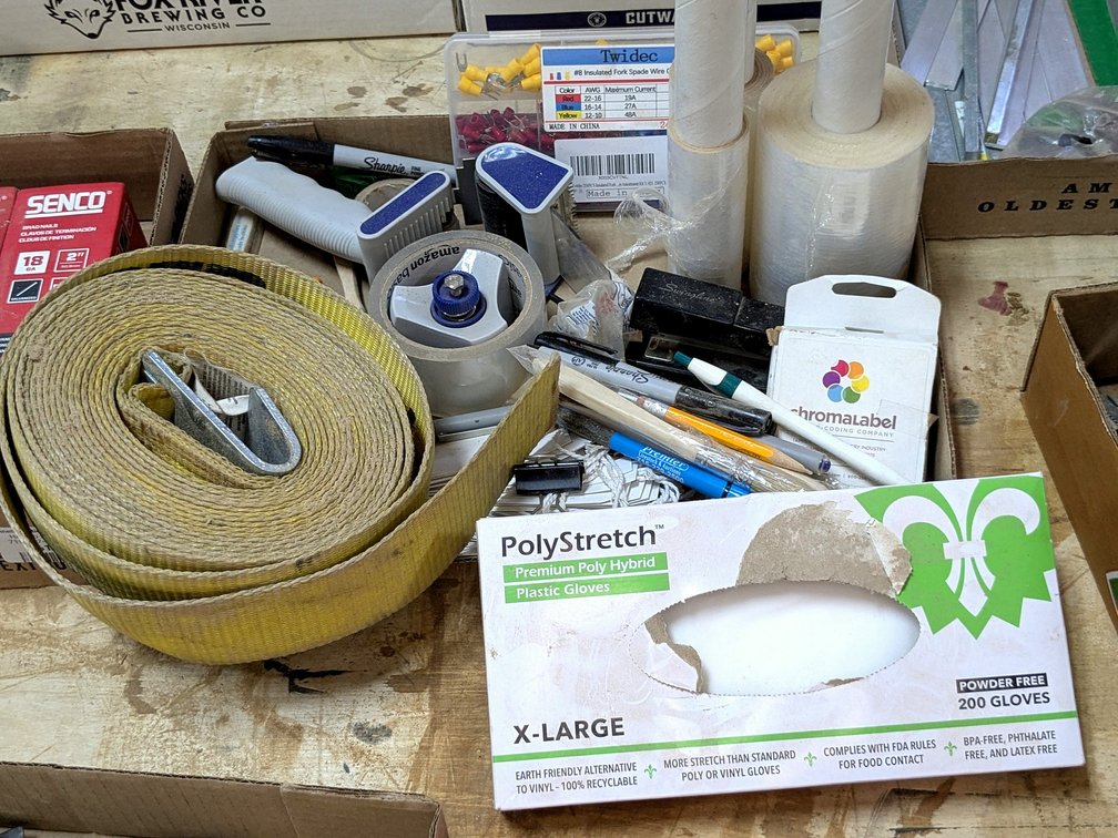 Office supplies including stapler, shrink wrap, wire fittings and more.