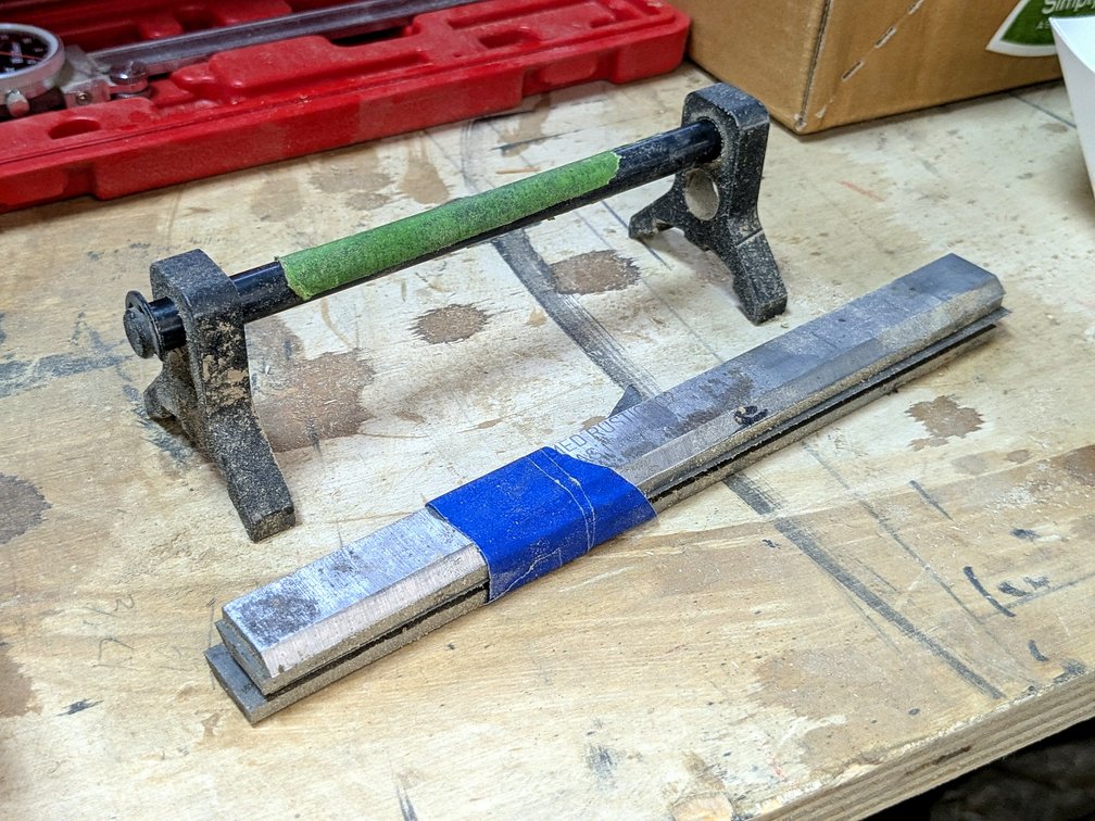 Four 8' jointer blades with height gauge.