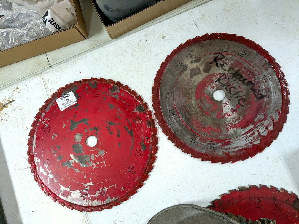 Two Diablo 12" circular saw blades have been freshly sharpened.