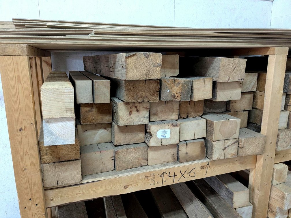 Rustic wooden posts up to 6" x 4" and 51" long.