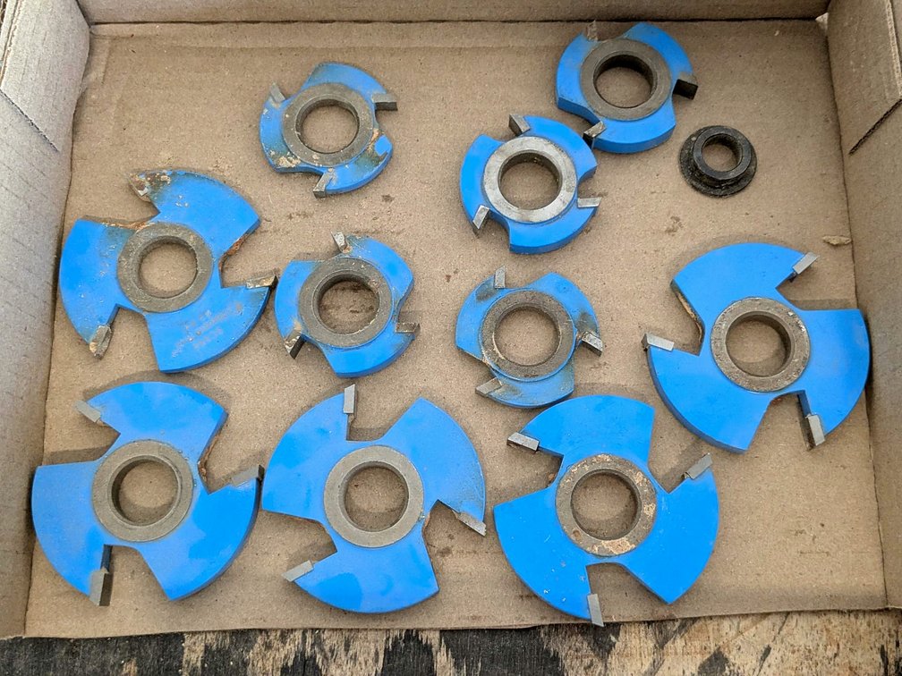 Amana Tool shaper bits, larger is marked 2-3/4" and all have a 3/4" bore.