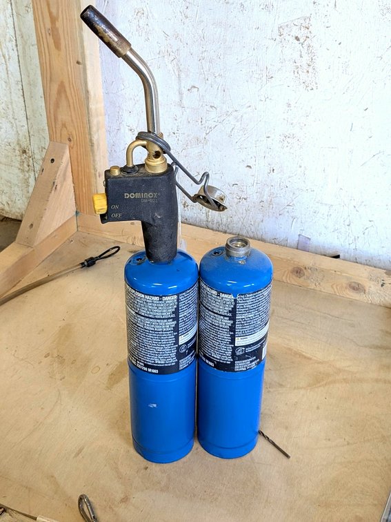 No shipping. Dominox instant-on torch head with two propane cylinders.