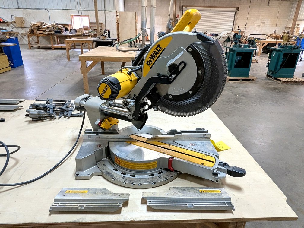 DeWalt DWS779 sliding compound miter saw with a 25" aluminum table.