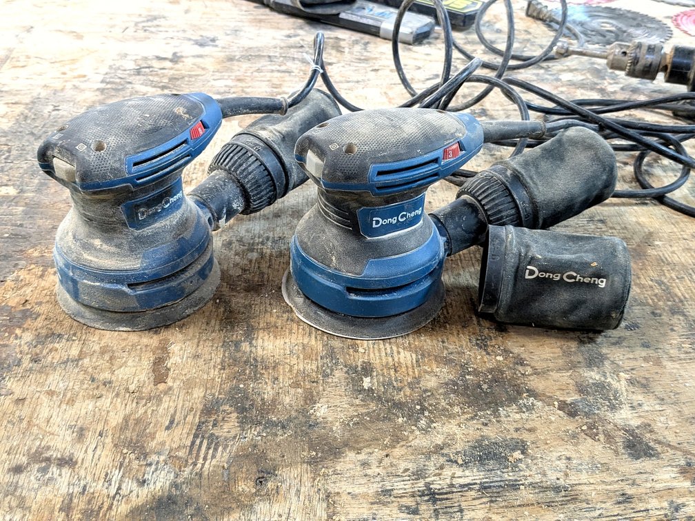 Two random orbit 4-3/4" sanders.