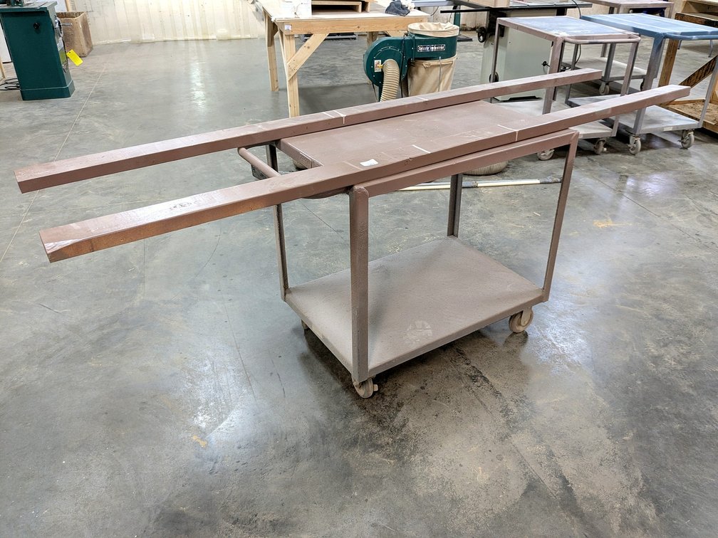 Rolling shop cart measures 42" and comes with two 8' mounted 2x4s.