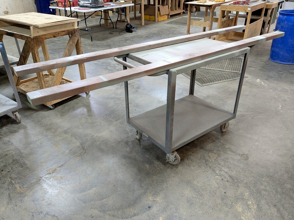 Rolling shop cart measures 42" and comes with two 8' mounted 2x4s.