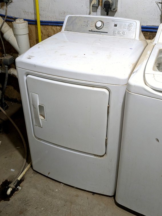 Criterion electric clothes dryer measures 27" x 27" x 44" high.