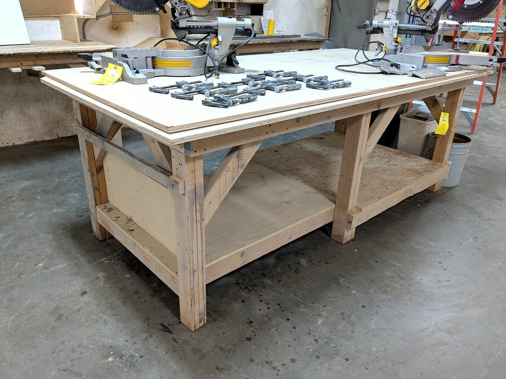 Sturdy work bench measures approx. 8' x 4' x 3' tall.