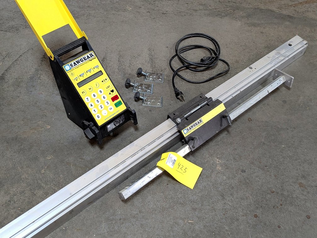 SawGear automatic length measuring guide is nearly 10' long and comes with control panel, cords and
