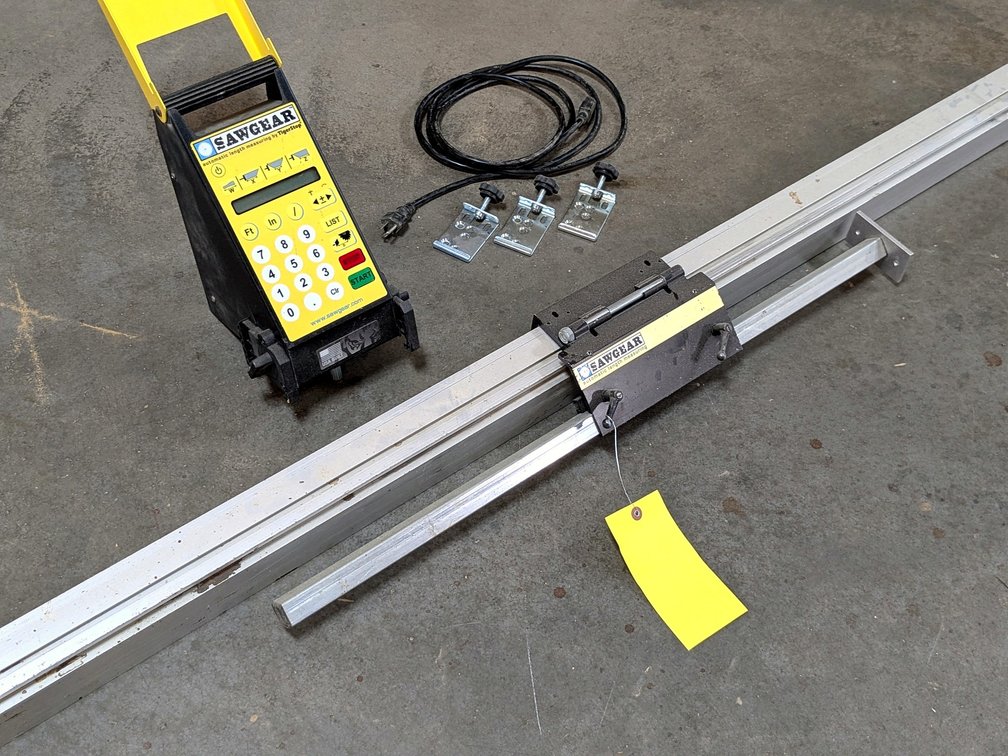 SawGear automatic length measuring guide is nearly 10' long and comes with control panel, cords and