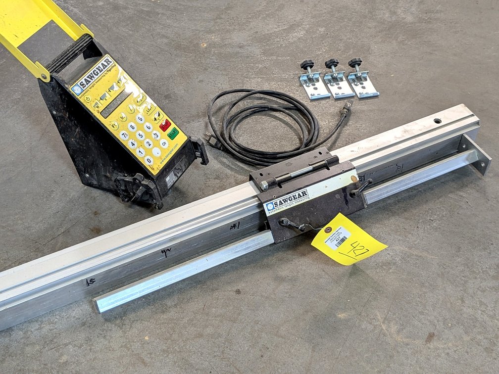 SawGear automatic length measuring guide is nearly 10' long and comes with control panel, cords and