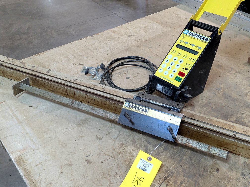 SawGear automatic length measuring guide is nearly 10' long and comes with control panel, cords and
