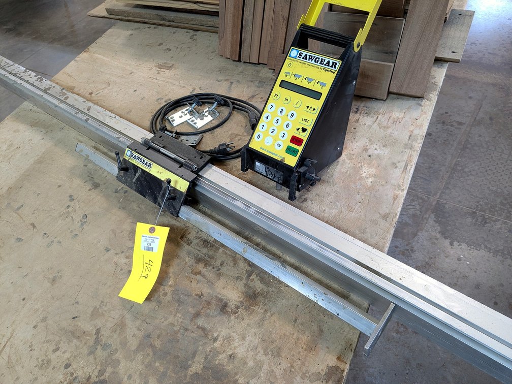 SawGear automatic length measuring guide is nearly 10' long and comes with control panel, cords and