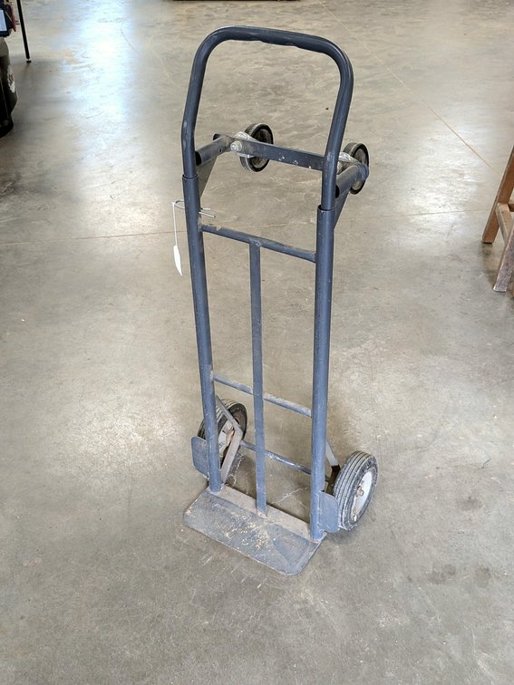 Hand cart measures 4' tall.
