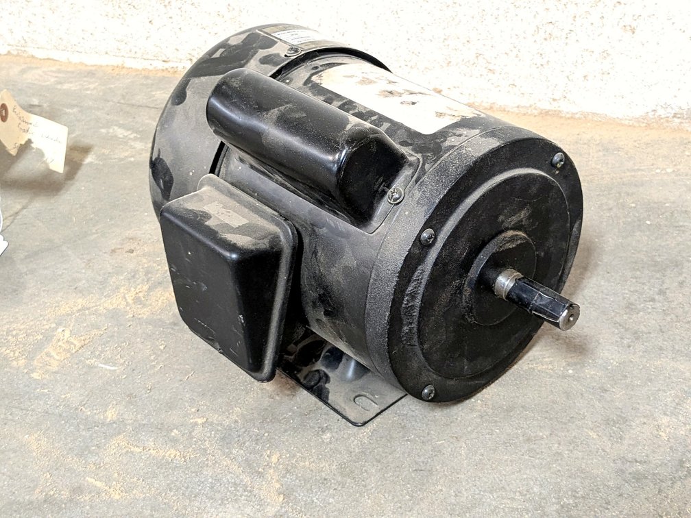 Powermatic 1 hp motor is Model 54A, has a 5/8" shaft and is rated for 115 and 230 volt.