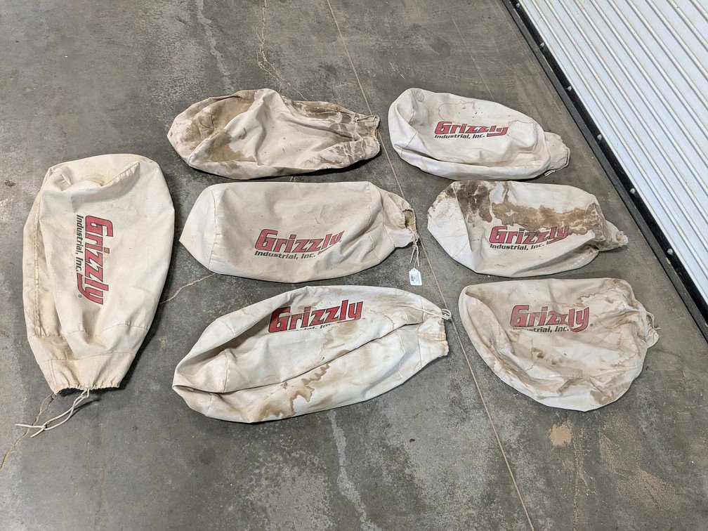 Several Grizzly dust collection bags.