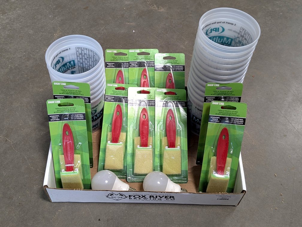 Several mixing cups and trim touch up pads.