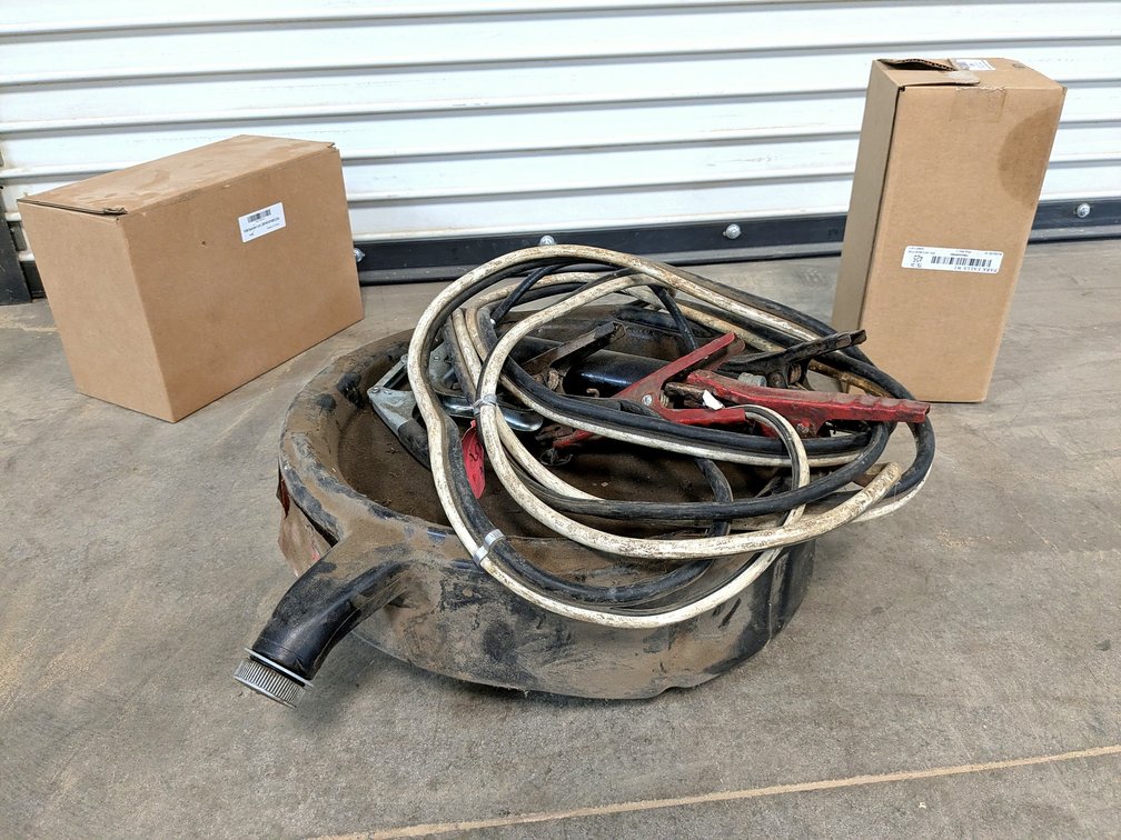 Automotive supplies including oil pan, jumper cables, filters and more.