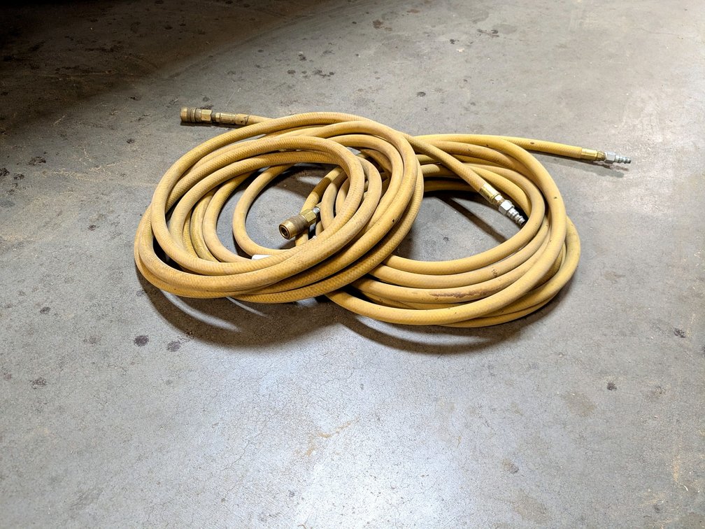 Continental ConiTech 3/8" air hose plus another.