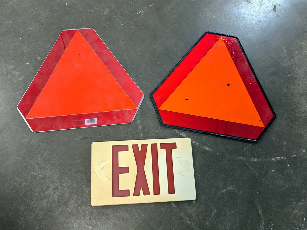 Two slow moving vehicle signs up to 14".