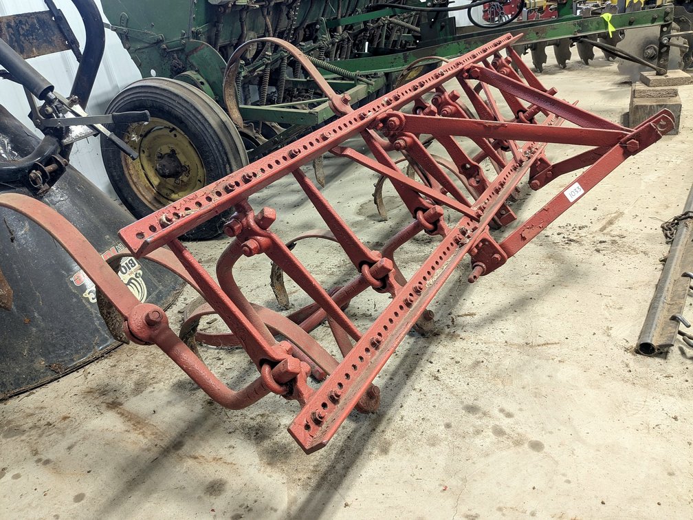 Spring tooth harrow, measures 7' wide.