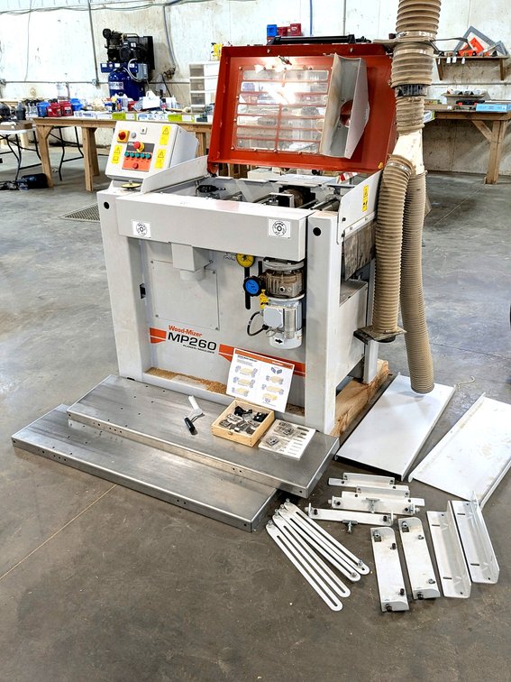 Wood Mizer MP260 planer/molder measures 64" overall.