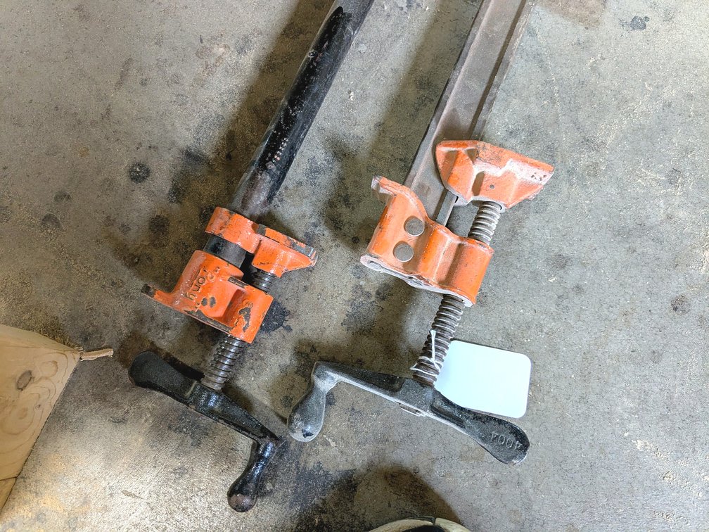 8' Pony Brand pipe clamp and 6-1/2' Jorgensen bar clamps.