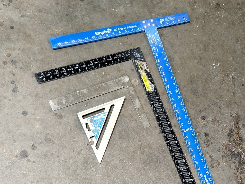 Empire 48" drywall T-square, Empire 7" Rafter square, Irwin and Mayes squares.