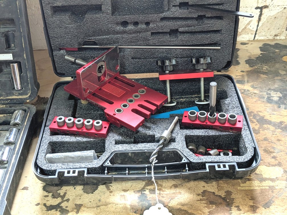 Cabinet hinge boring jig with hard case.
