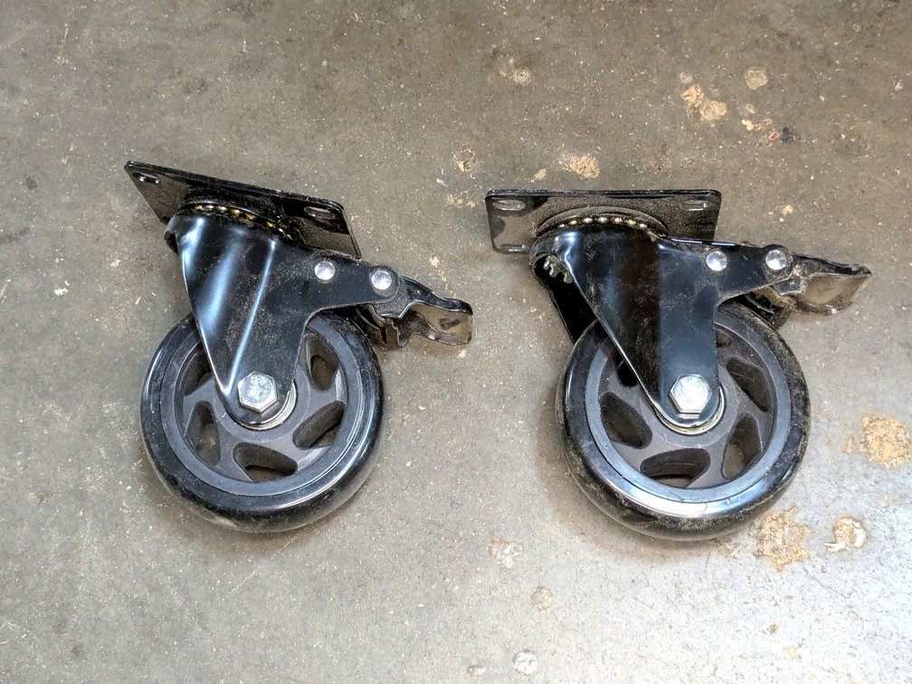 Pair of swiveling casters are 5" tall.