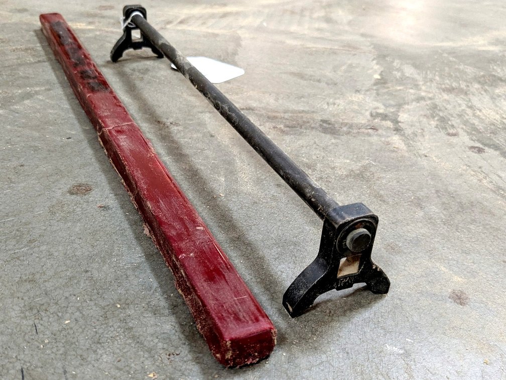 Set of planer blades measure 20" long and a planer blade height gauge.